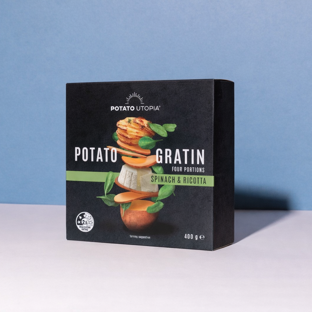 Box of Potato Gratin with Spinach & Ricotta on a blue background